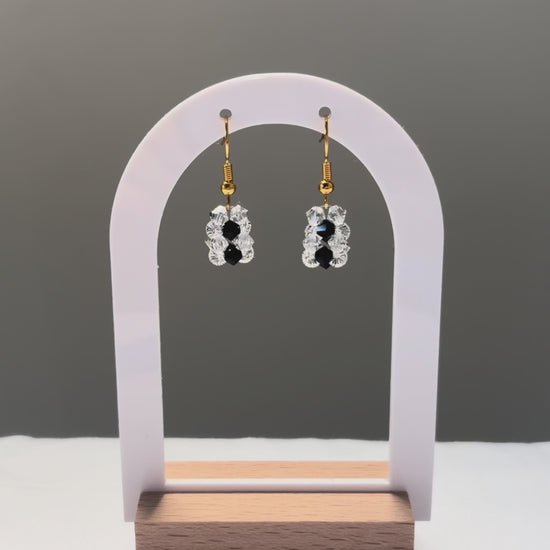 A video of the Striped Earrings Bossanova dangling in the sunlight, sparkling beautifully. 
