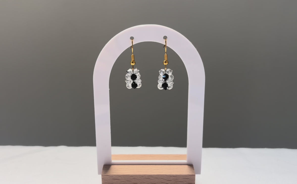 A video of the Striped Earrings Bossanova dangling in the sunlight, sparkling beautifully. 