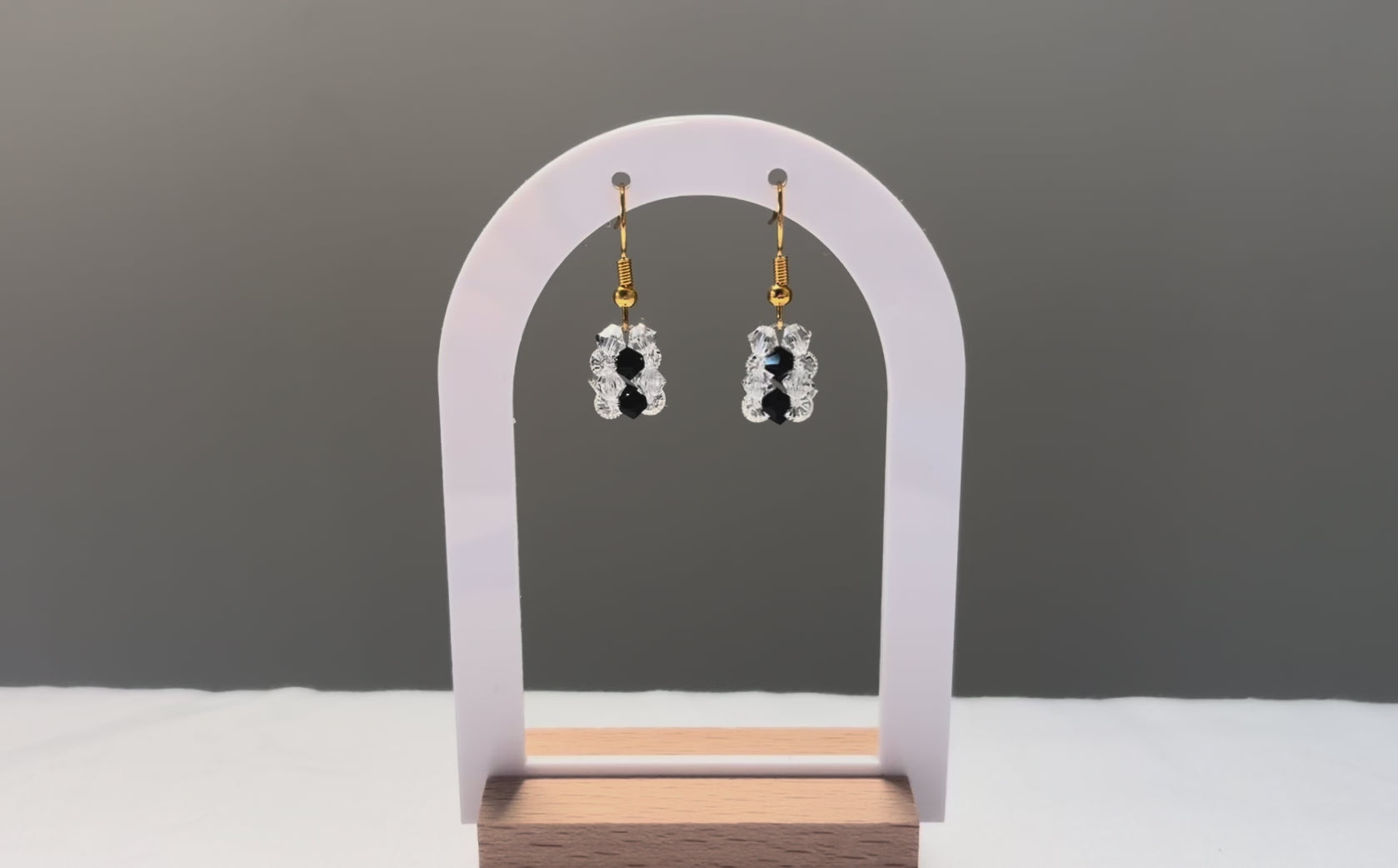 A video of the Striped Earrings Bossanova dangling in the sunlight, sparkling beautifully. 