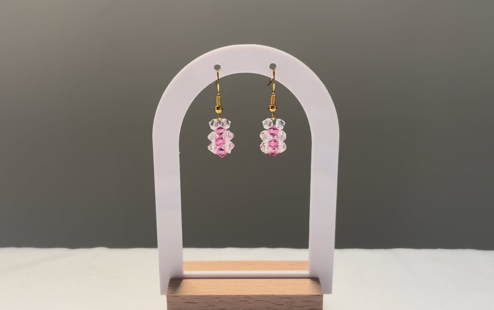A video of the Striped Earrings Kylie Mariposa dangling in the sunlight, sparkling beautifully. 
